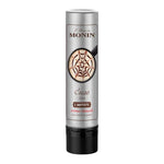 Monin Cacoa Latte Art 150ml bottle, dry grocery product with a sleek black label, ideal for creating latte art and chocolate flavoring.