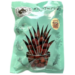 Im-Erb Chinese Dates drink in a glass, showcasing the dark, rich color of the traditional herbal beverage.