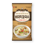 Sempio Clam Noodle Soup Kal Guksu in a bowl with noodles, clams, and broth, ready to serve.