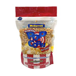 Mcgarrett Corn Kernels 560g in a clear plastic bag, showing bright yellow dry corn kernels for cooking or snacking.