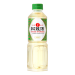 Bottle of Hinode Ryorishu soy sauce in a grocery store, showcasing the Hinode brand and dark liquid inside the container.