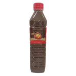Pa-thong Patong fermented fish sauce in a 500ml bottle, used in Thai cuisine, with clear label and dark liquid inside.