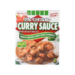 House Carryya Curry Medium Hot Sauce bottle, grocery product with a red and yellow label, suitable for adding flavor to dishes