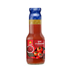 Chua Hah Seng Tomato Ketchup 330g bottle, dry grocery condiment with classic red sauce, shown in front of a plain background.
