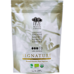 Organic Mivana roasted coffee beans labeled Signature, shown in a close-up image highlighting the rich, dark coffee beans.