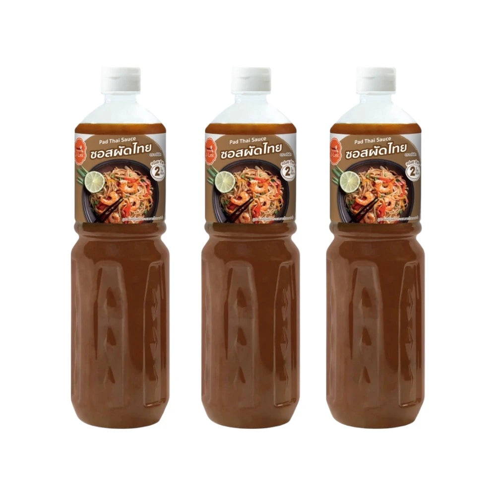J-LEK Pad Thai Sauce in three 590g bottles, rich and flavorful Thai cooking sauce with authentic taste.