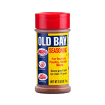 Jar of McCormick Old Bay Seasoning with spices and herbs, used for seafood and seasoning dishes.