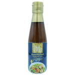 Roi Thai Shrimp Paste Sauce jar for cooking and flavoring, with a label showing Thai ingredients and branding.