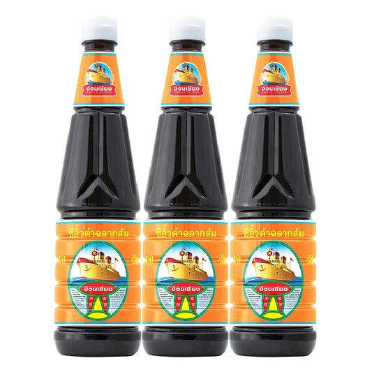 NGUAN CHIANG dark soy sauce bottle, 940g, shown with rich dark liquid, suitable for cooking Asian dishes.