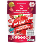 Gina's Table Merries Freeze-Dried Strawberries in clear packaging, showing vibrant red, crunchy snack pieces for confectionery lovers.