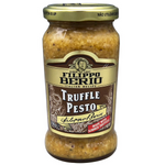 Jar of Filippo Berio Truffle Pesto with basil and truffle pieces, displayed in a glass jar on a white background.