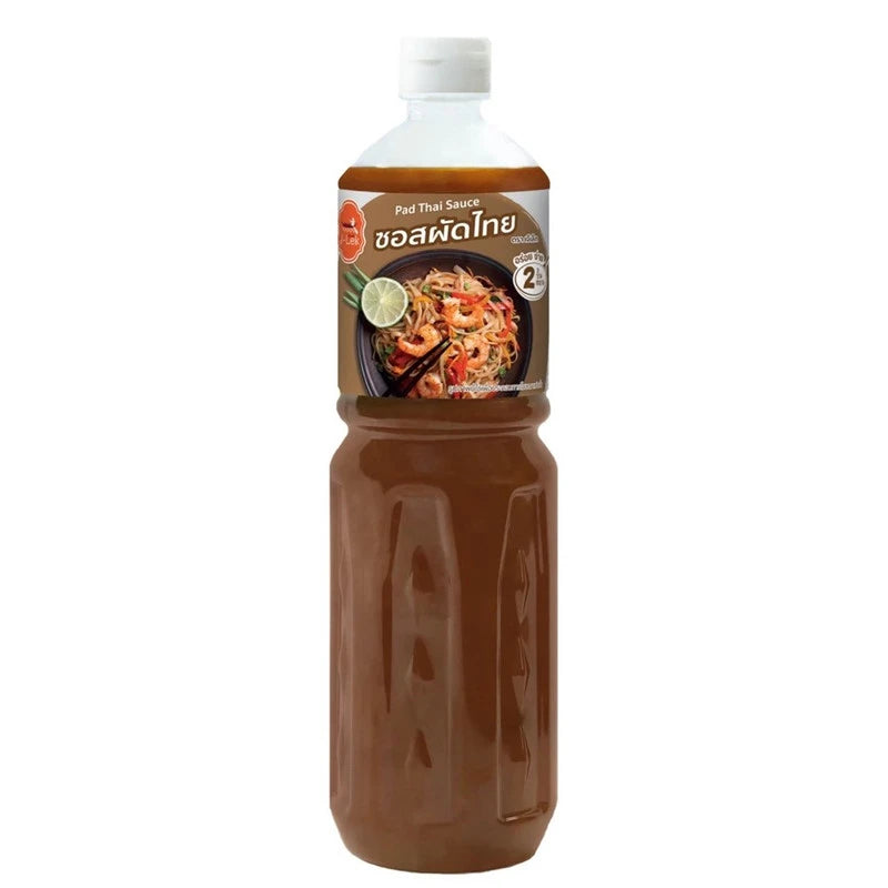 J-LEK Pad Thai Sauce 590g jar with label, showcasing authentic Thai flavor for stir-fry and noodle dishes