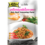 Lobo Holy Basil Seasoning Paste in a jar, vibrant green paste with fresh basil herbs, used for flavorful Asian cuisine cooking.