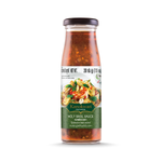 Bottle of Kanokwan Holy Basil Sauce from the grocery aisle, with label showing basil leaves and Thai-inspired branding.