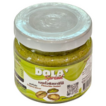 Dairydough Pistachio Butter jar with green pistachio nuts and label, showcasing creamy nut spread on a white background.