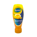Remia Mayonnaise 500ml bottle, creamy dry grocery condiment with a smooth texture and white appearance.