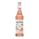 Bottle of MONIN White Peach Syrup in 700ml bottle, ideal for cocktails and beverages, with a clear label and white cap.