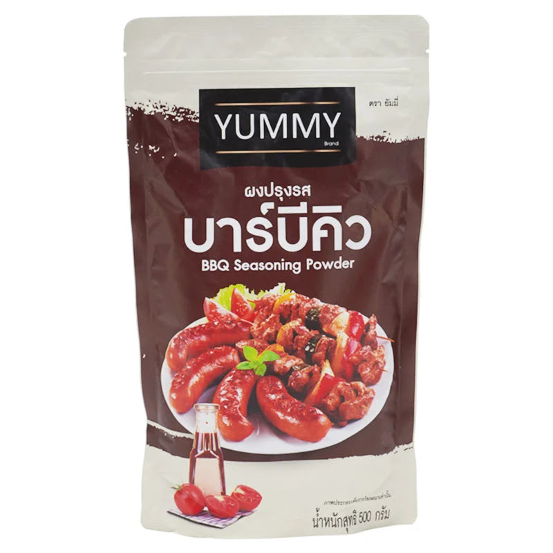 YUMMY BBQ Seasoning Powder in a 500g container, close-up of the spice blend with herbs and spices visible.