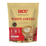 Ucc White Coffee 3-in-1 instant creamy drink in a glass cup with a frothy top, showcasing its smooth and rich texture.