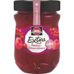 Jar of Schwartau Extra Raspberry jam with fresh raspberries and spreadable texture, shown in a clear glass jar.