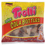 Colorful Trolli Sour Cola candies in a clear bowl, showcasing their chewy texture and vibrant, sour-coated appearance.