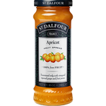 Jar of St. Dalfour Thick Apricot preserve with visible apricot chunks and vibrant orange color.