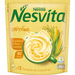 Nestle Nesvita Crispy Corn cereal drink in a glass, showcasing the colorful cereal pieces and creamy texture.