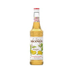 Monin Mango Syrup 700ml bottle for dry grocery, featuring a vibrant label and clear plastic packaging.