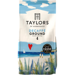 Taylors Decaffeinated Roasted Coffee drink in a glass bottle, showcasing a rich, dark coffee beverage with a smooth finish.