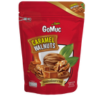 Gomuc Caramel Walnuts confectionery snacks in a bowl, showcasing glossy caramel-coated walnuts on a white background