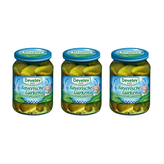 Three bottles of DEVELEY Bavarian Gherkins pickled cucumbers, 670g each, with fresh, crunchy gherkins visible in clear glass bottles.