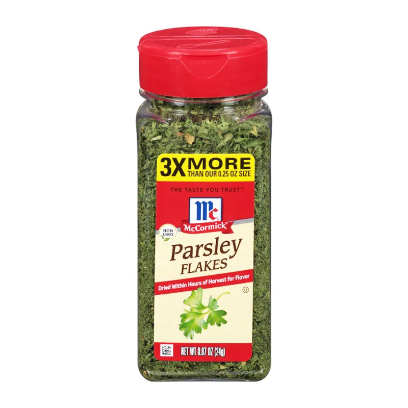 MCCORMICK Parsley Flakes in 24g jar, close-up of dried green parsley flakes on the product label.