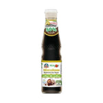 Deksomboon Mushroom Soy Sauce Less Sodium bottle, 300ml, in a clear plastic container with a green cap, for dry grocery use