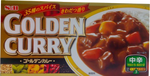 S&B Golden Curry Mild Hot package with curry sauce cubes and ingredients in a grocery store setting
