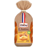 Golden St Michel Madeleines arranged on a white plate, showcasing their classic shell shape and buttery texture.
