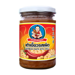 Healthy Boy Soybean Paste with Chili in a jar, Asian grocery condiment with red chili peppers and soybean paste visible.
