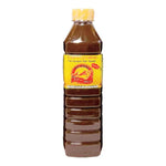 Bottle of PA-THONG Patong Fermented Fish Sauce 500ml for dry grocery cooking, featuring the label and transparent container.