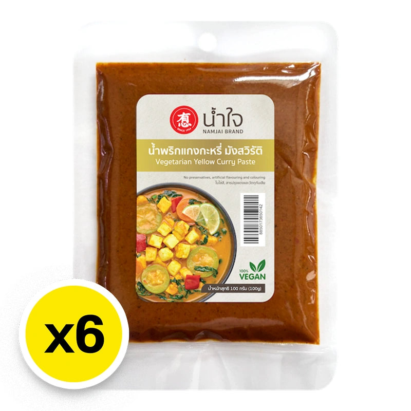 NAMJAI Yellow Curry Paste 100g, pack of six, in a vibrant yellow paste container, ideal for authentic Thai curry cooking.