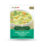 Kanokwan Green Curry Paste in a jar, Thai grocery product with vibrant green curry paste visible inside.