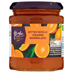 Sainsbury's Taste The Difference bitter Seville orange marmalade jar with orange slices and spread on toast