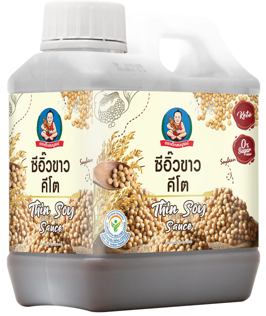 Bottle of DEKSOMBOON Thin Soy Sauce Keto in a 1000 ml container, featuring clear packaging and dark soy sauce inside.