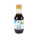 Tutiya Picante Jazzy Garlic Sauce bottle with label, showcasing spicy garlic sauce in a clear glass container.