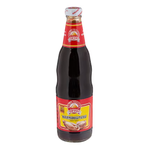 Golden Mountain Oyster Sauce bottle, a grocery product with a yellow cap and label featuring Asian-inspired design.