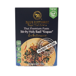 Blue Elephant Thai Basil Stir Fry Paste in a jar, showcasing vibrant blue and green herbs, perfect for flavorful Thai cooking.