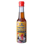 Kikkoman Shabu Shabu Soup Base bottle with label, Japanese-style hot pot soup base for shabu shabu cooking.