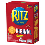 Golden Ritz Crackers, crispy confectionery snack with a classic square shape and ridged edges, arranged on a white background.