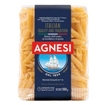 Dry Agnesi Penne Rigate No.19 pasta in a 500g package, showcasing the dry, ridged Italian pasta in a clear bag.