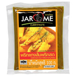 Jarome Yellow Curry Paste 100g, dry grocery product, with vibrant yellow spice paste in a jar for cooking flavorful Thai dishes.