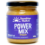 Sunshine Power Mix Spread jar with label, showing creamy texture and colorful ingredients, on a white background.