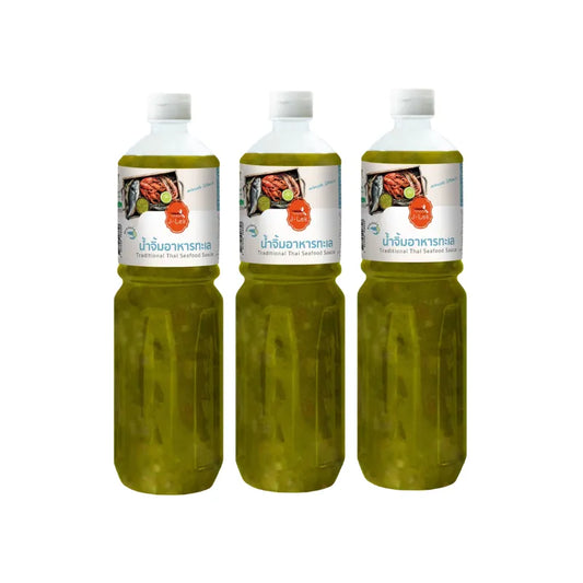 J-LEK seafood dipping sauce in a 1100g plastic bottle, shown in a pack of three, with sauce poured into a bowl.